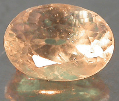 Natural Alexandrite under incandescent light